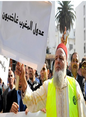 عدول المغرب يتوقفون عن العمل مع تنظيم وقفة احتجاجية امام البرلمان ..